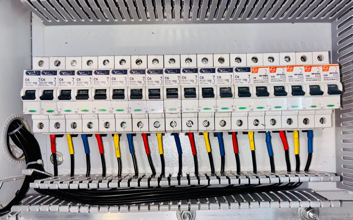 Circuit-breaker panel with neatly organized color-coded wiring